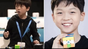 Djaloshi nëntëvjeçar nga Kina thyen rekordin e shpejtësisë së zgjedhjes së kubit të Rubikut